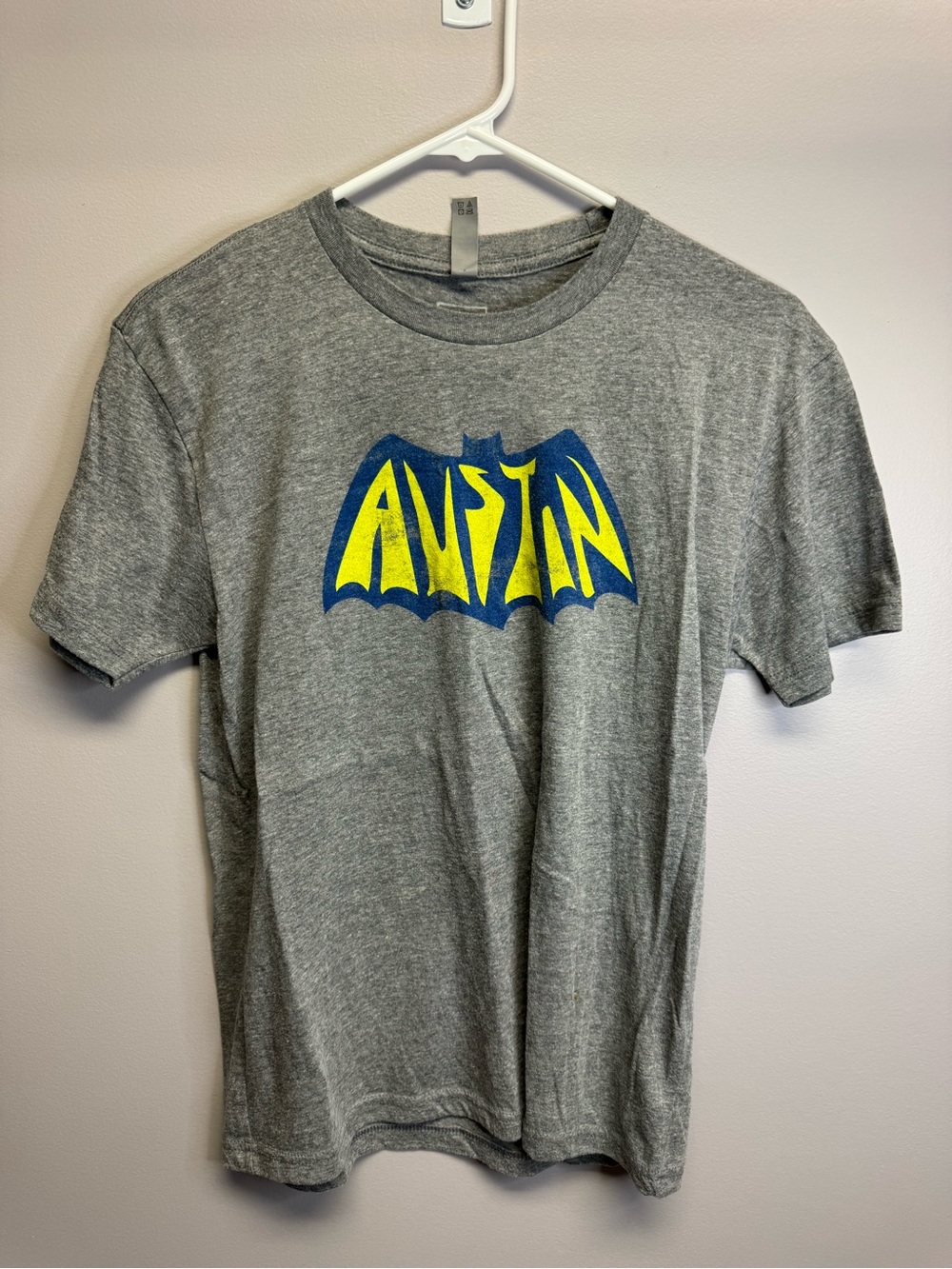Next Level Apparel Gray T-Shirt with Yellow and Blue Austin Bat Graphic